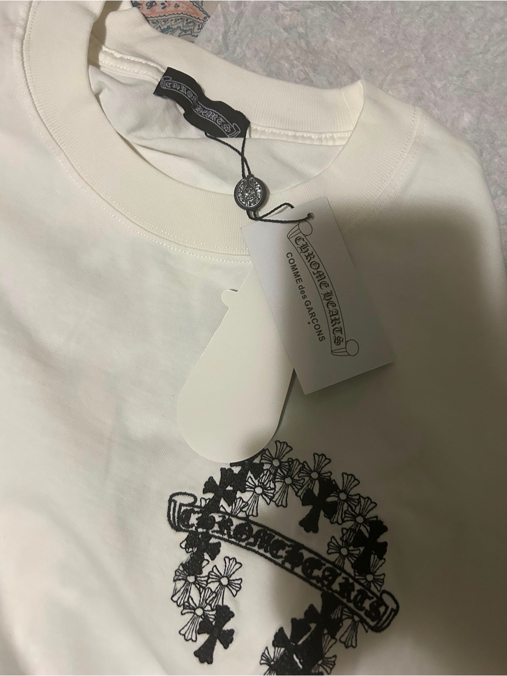 Comme des Garçons White Short-Sleeve T-Shirt with Black Floral Crest